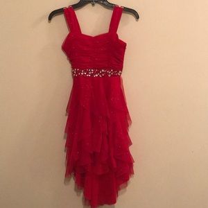 Red high-low drew with jeweled belt